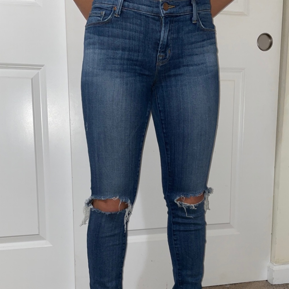 Skinny dark blue ripped jeans